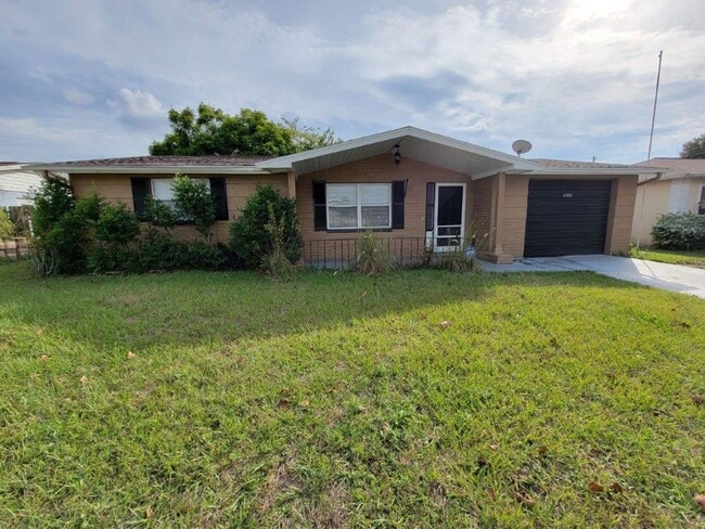 Building Photo - BEAUTIFUL 2/1/1 864Sq. Ft. with tile/wood ... Rental