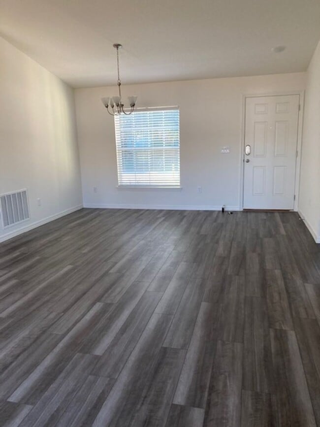 Photo - Like new 3/2/2 with screened in porch! Located close to the beach, shopping, parks and so much mo...