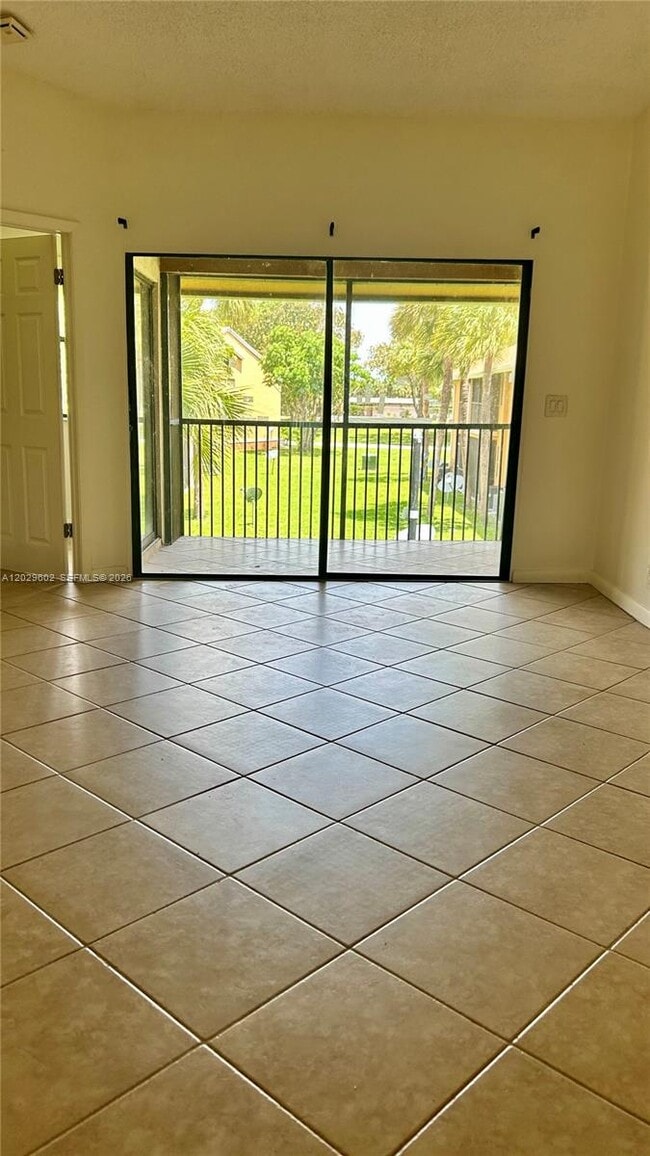 Building Photo - 2481 NW 56th Ave Unit 6-16