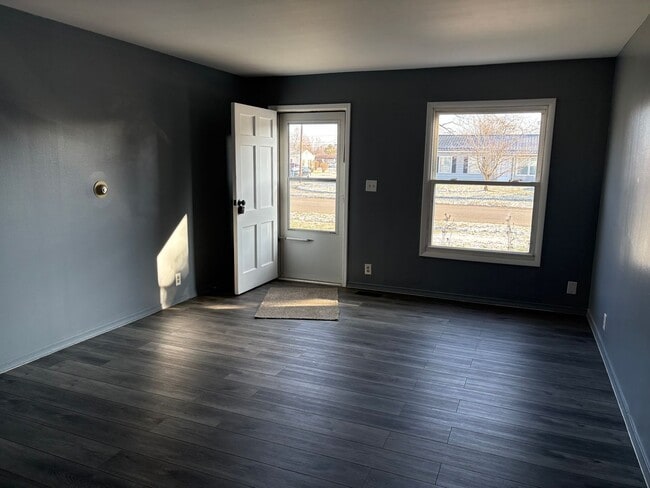 Photo - three bedroom one bath home with attached garage for rent