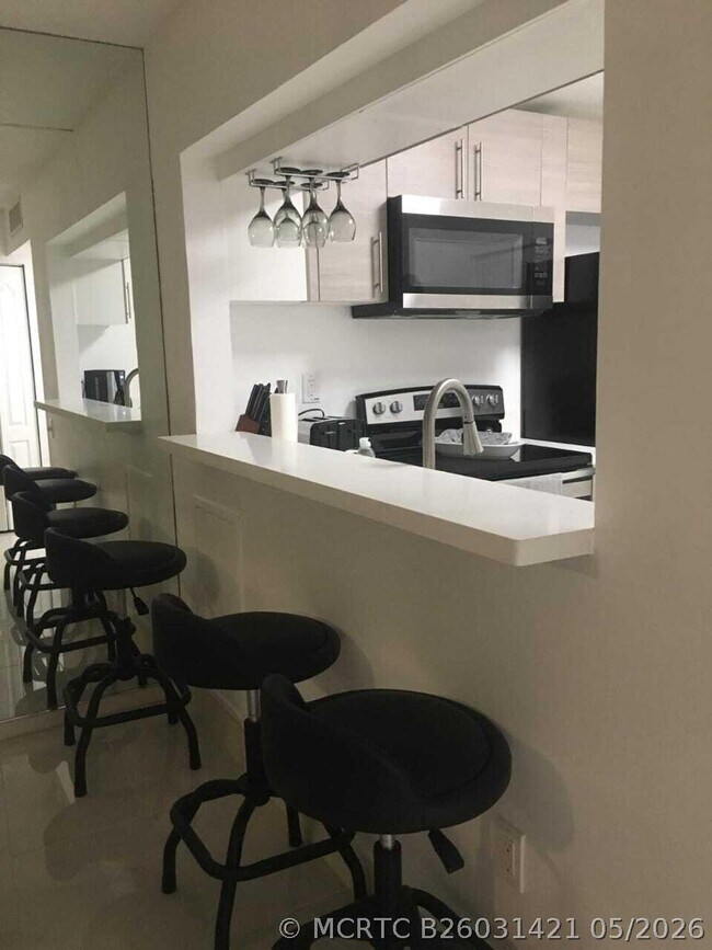 Photo - 9091 Lime Bay Blvd Unit 212