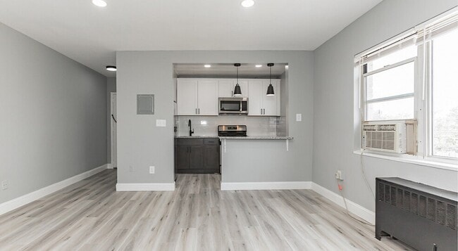 Living Room/Kitchen - Courtyard Park