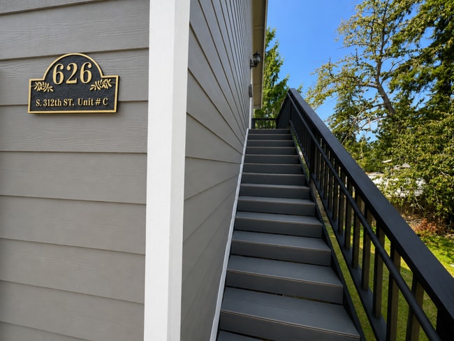 Building Photo - Elevated 3-Bedroom Home with Secure Garage & Cozy Living Space Unit C