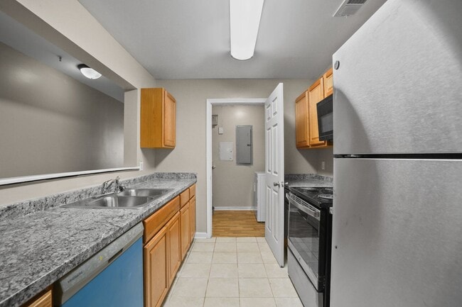 Photo - Spacious Three-Bedroom Condo with In-Unit Laundry