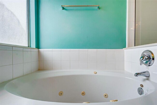 Photo - This one-story, three-bedroom, two bath ho...