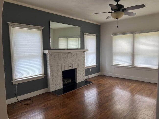 Photo - Charming 3-Bedroom, 1.5-Bath Single-Family Home with Bonus Living Space