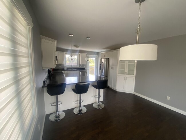 Photo - 166 Cougar Crescent Unit 1