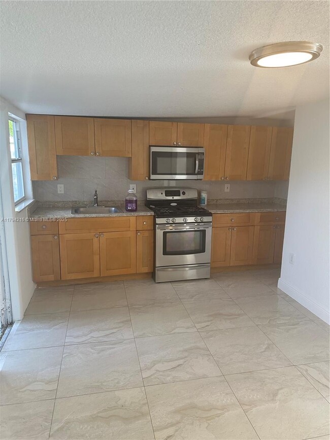 Photo - 2250 NW 103rd St Apartment Unit C