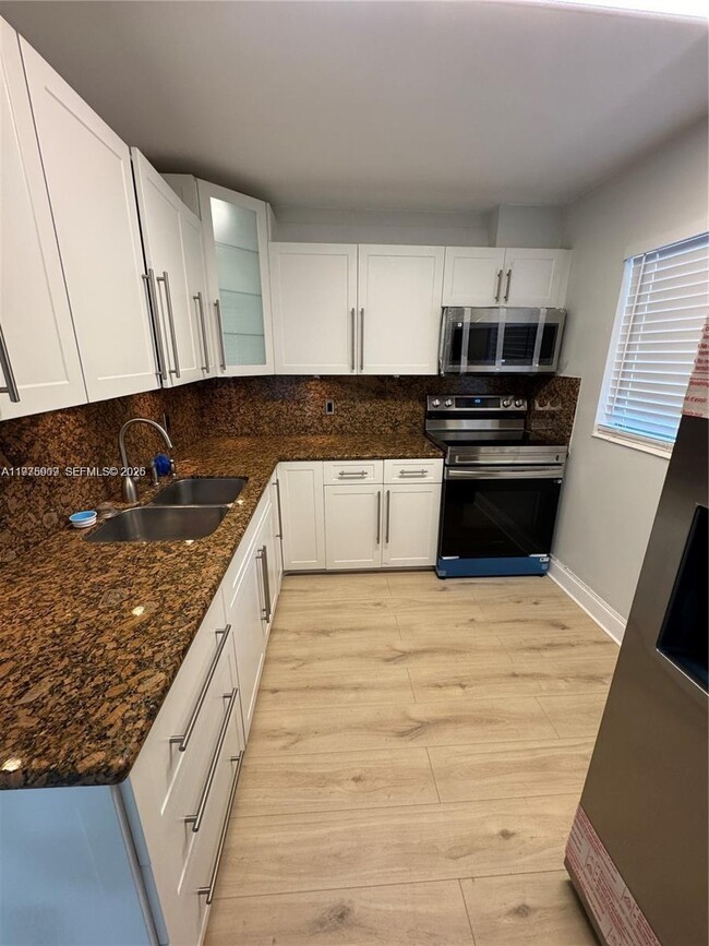 Building Photo - 7745 SW 86th St Unit D-315