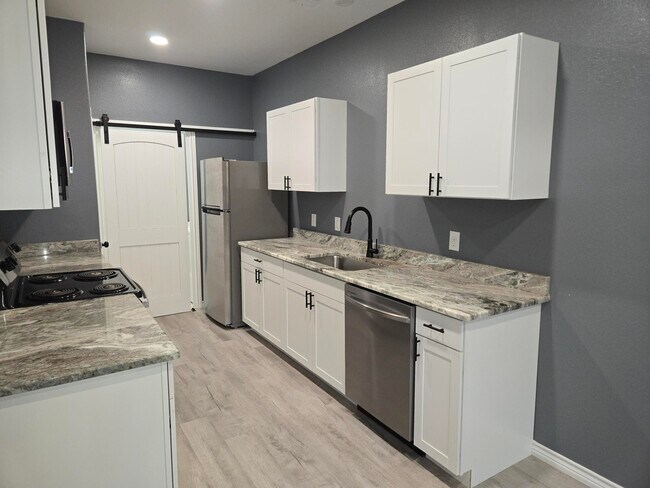 Photo - 409 S Steen Dr Unit 104