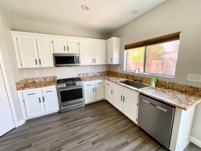 Photo - Southwest Beautiful and spacious 2 story house near Blue Diamond and I-15. Home has hard flooring...