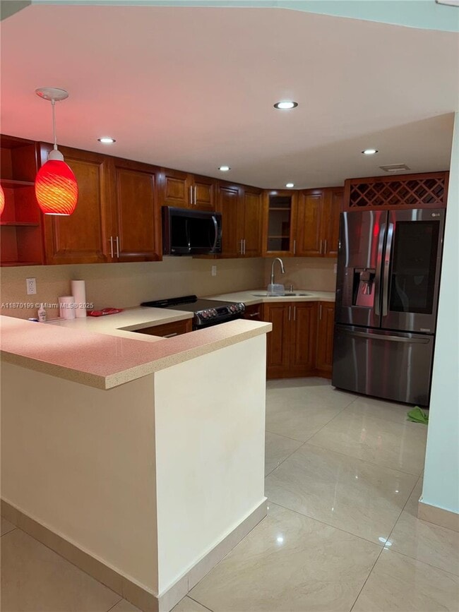 Building Photo - 6801 Harding Ave Unit 317 Rental