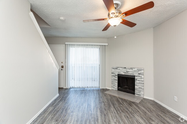 1BR, 1BA TOWNHOME - 700SF Living Room With Fireplace