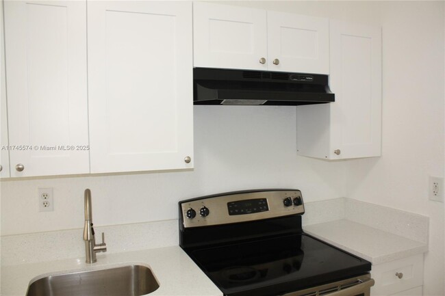 Photo - 1095 W 77th St Apartment Unit 113