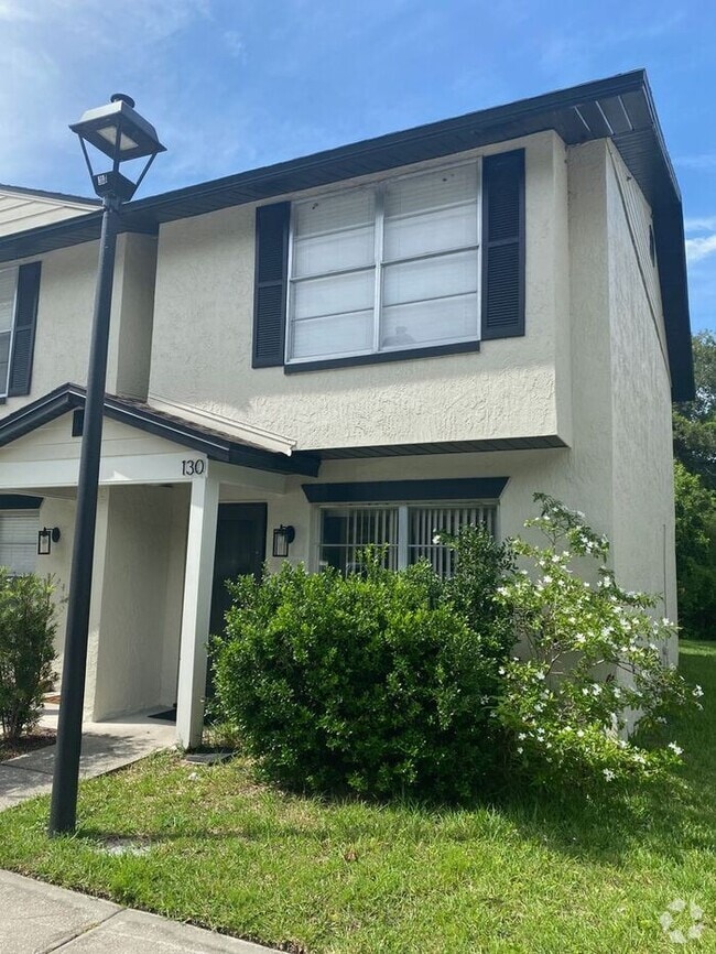 Building Photo - 2/1.5 Townhome Wth Fireplace! Across From ...