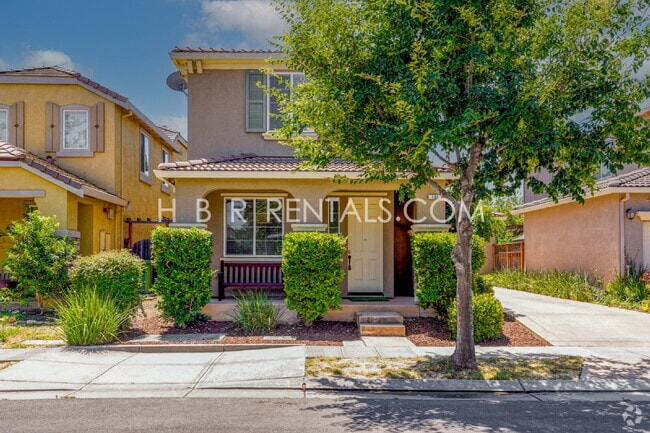 Building Photo - Questa Village: Spacious 3-Bedroom Retreat... Rental