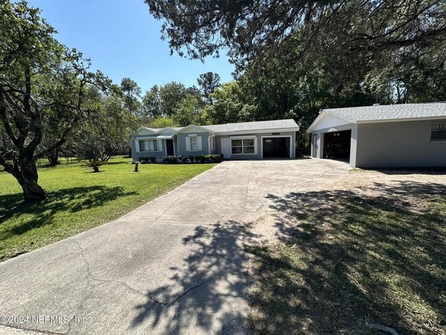 Building Photo - 6540 Trout River Blvd Rental