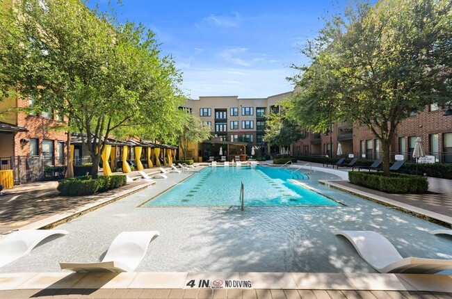 Pool with Cabanas & Sun Ledge - AMLI West Plano Apartments