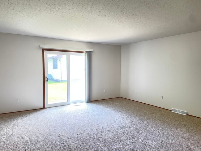 Living Room with door to Patio - 5049 Catawba Dr