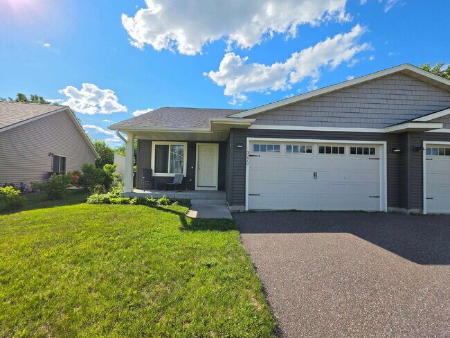 Spacious 4-Bedroom Home with Vaulted Ceilings, Finished Lower Level & 2-Car Garage