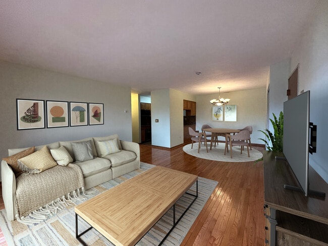 Virtually staged living room and dining room - 340 Sunderland Rd Unit 17A