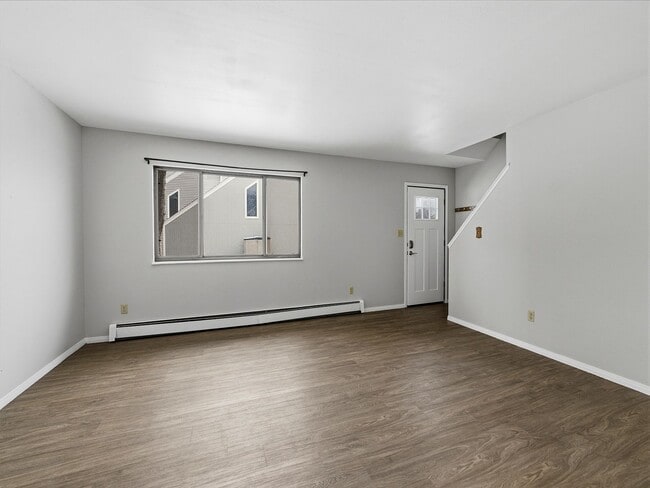 Photo - Spacious 2 Bed Condo W/ Bonus Basement Room, Fireplace & Garage Available NOW!
