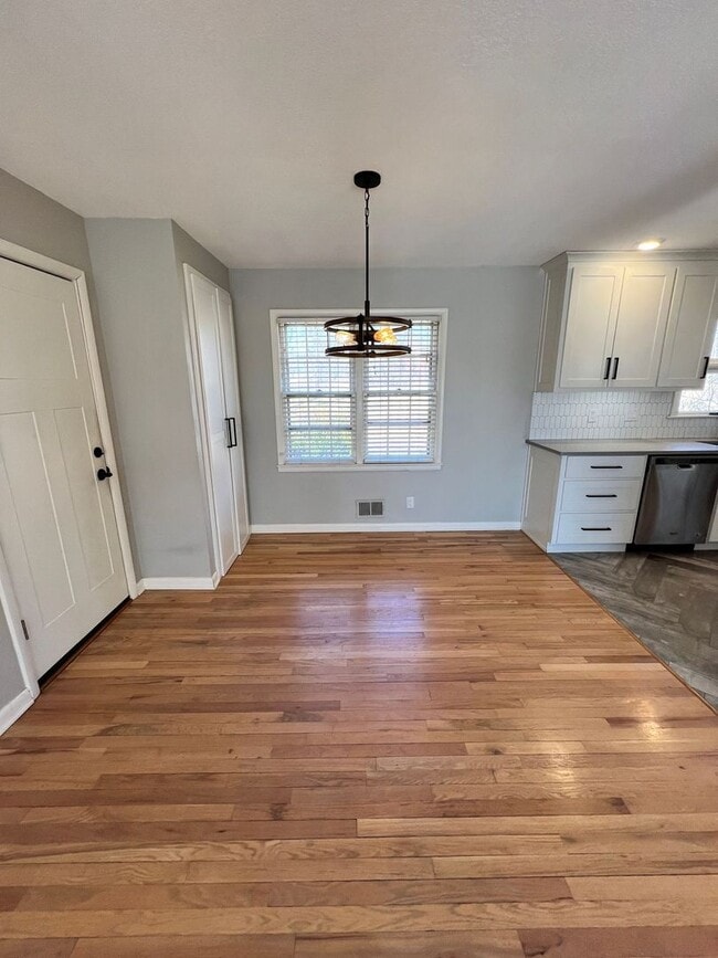 Photo - 3-Bed, 2-Bath Home with Garage & Spacious Backyard!