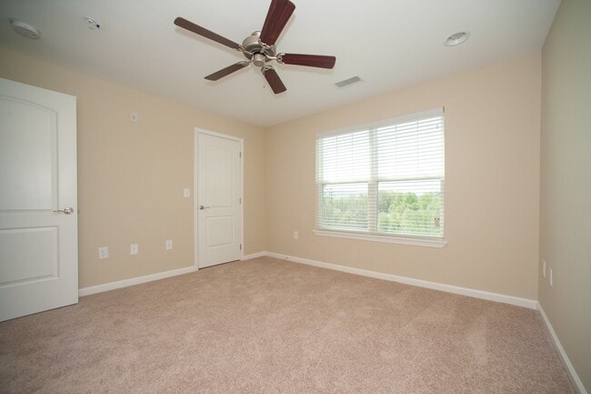 Photo - 3 Bedroom Townhouse at the Woodlands - END UNIT * only $500 deposit - End Unit- 1 month free when... Unit #201