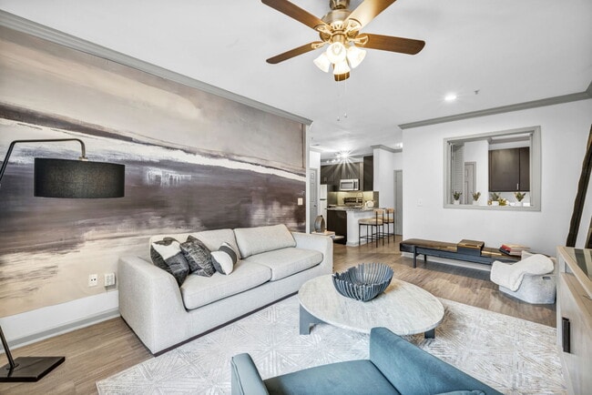 One bedroom - living room with wood-style flooring