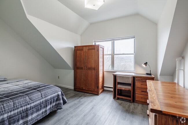 4BR, 1.5BA - 1,415SF Furnished Bedroom