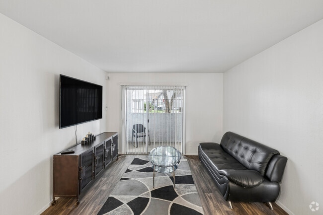 2BR, 2BA - 856SF - Living Room - Palm Aire Apartments