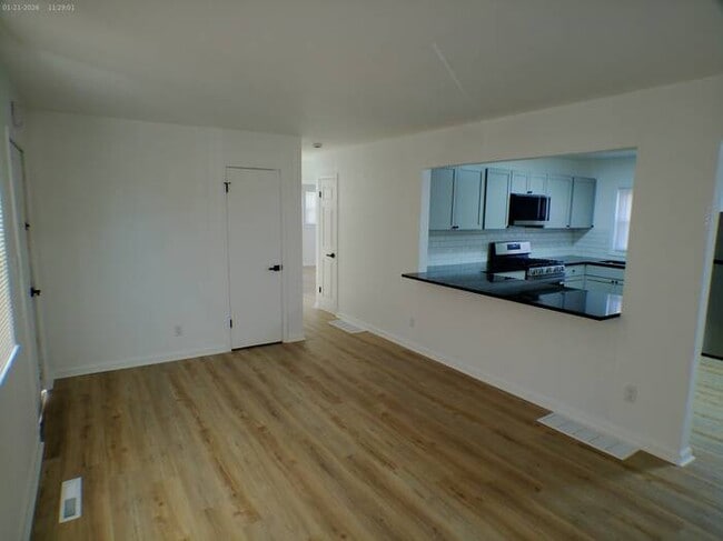 Photo - Beautiful 4 bedrooms and 2 full baths with vanity in a beautiful house at Longwood Ave Kansas Cit...