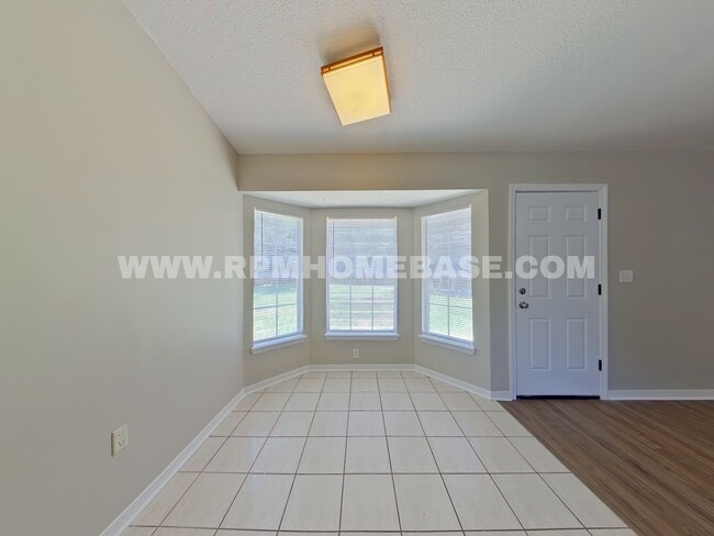 Photo - Charming & Updated 3BR/2BA plus Flex Room with Massive Privacy-Fenced Backyard
