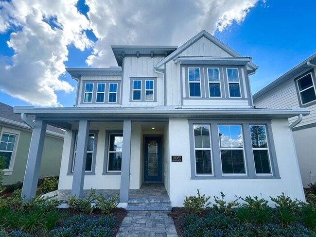 Building Photo - Gorgeous 4/3 Residence with a Private Back Lanai and a 3 Car Garage in the Delightful Laureate Pa...