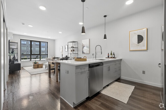 1BR, 1BA - 715SF - Kitchen and Living Room