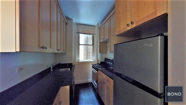 Photo - 25 E 10th St Unit 1A