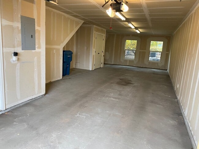 Photo - Large garage with attached spacious 2 bedroom townhome