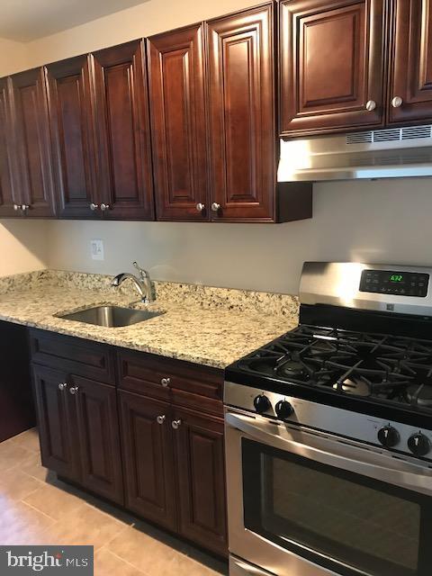 Building Photo - 7127 Donnell Pl Unit C