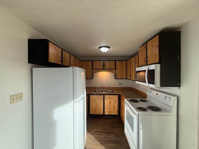 Photo - Modernly updated two bedroom, one and half bathroom townhome located within walking distance to R...