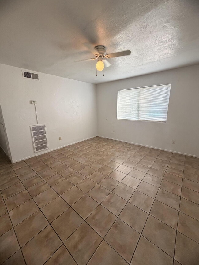 Photo - Spacious 3 Bed / 1 Bath Apartment with Open Layout & In-Unit Laundry Unit A