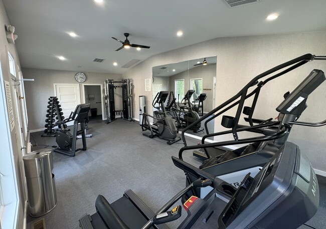 24/7 Fitness Center with Stair Machine, Treadmill, Bike, Elliptical, Weights, Universal Gym, & more!