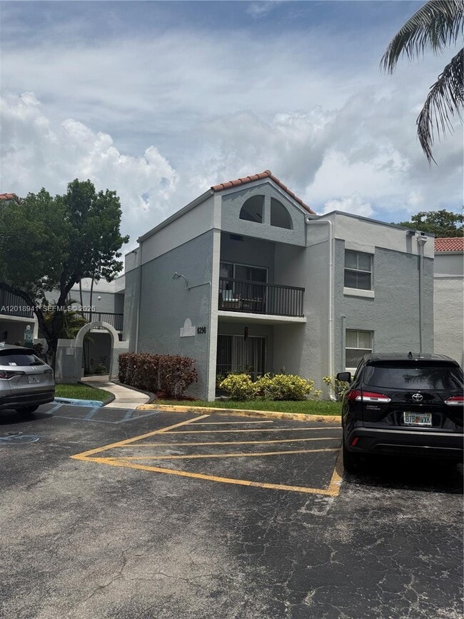Building Photo - 6296 NW 186th St Unit 205