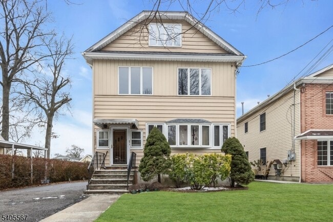 Building Photo - 128 E Colfax Ave Unit 2