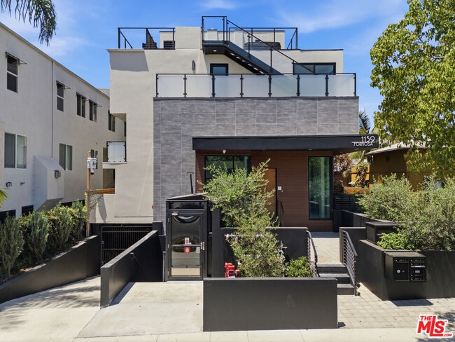 Building Photo - 1159 N Formosa Ave Unit 5