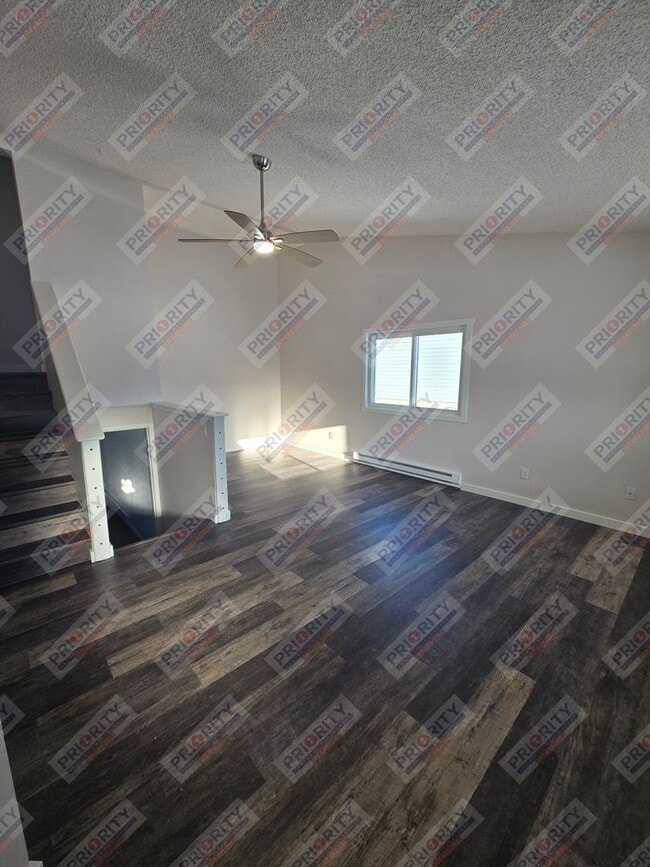 Photo - Single family home with a garage