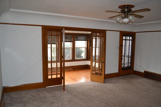 Living room to Front Sun room - 1448 S 73rd St Unit 1448