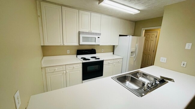 Photo - 2428 E University Dr Unidad #1207