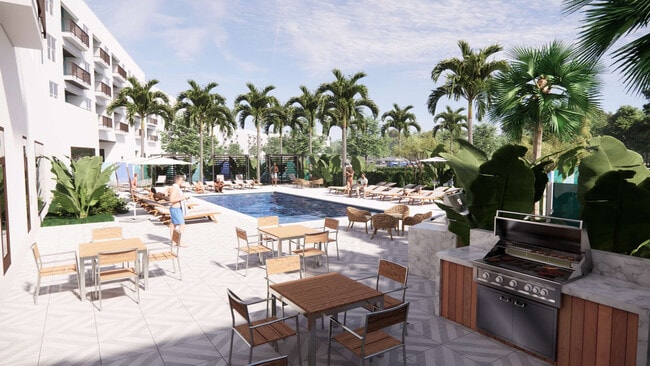 Grilling area with pool in the background