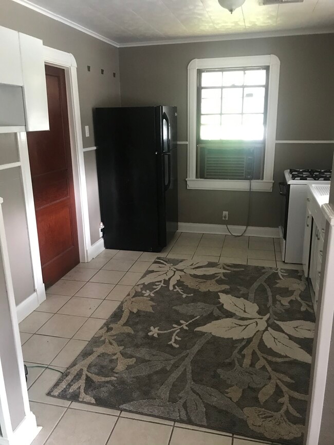 Kitchen pictured from the dining room/makeshift second bedroom