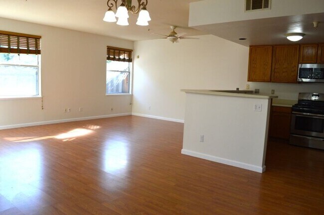 Photo - Spacious Three-Bedroom Two-Story Townhome with Garage and Private Yard